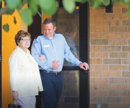 Dial A Ride Driver Jack Simpson Escorts Marilyn Helm To Her Dial A Ride Bus