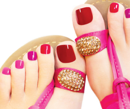 A soothing pedicure with colorful nail polish can be the perfect pick-me-up