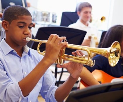 How learning to play a musical instrument can help your child in school